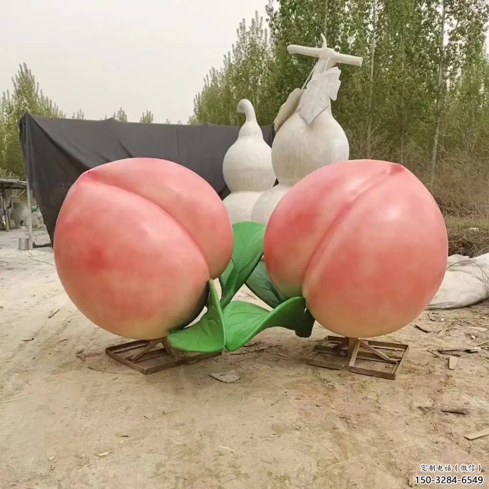 草地桃子雕塑 現(xiàn)代校園果蔬雕塑 大型水果雕塑